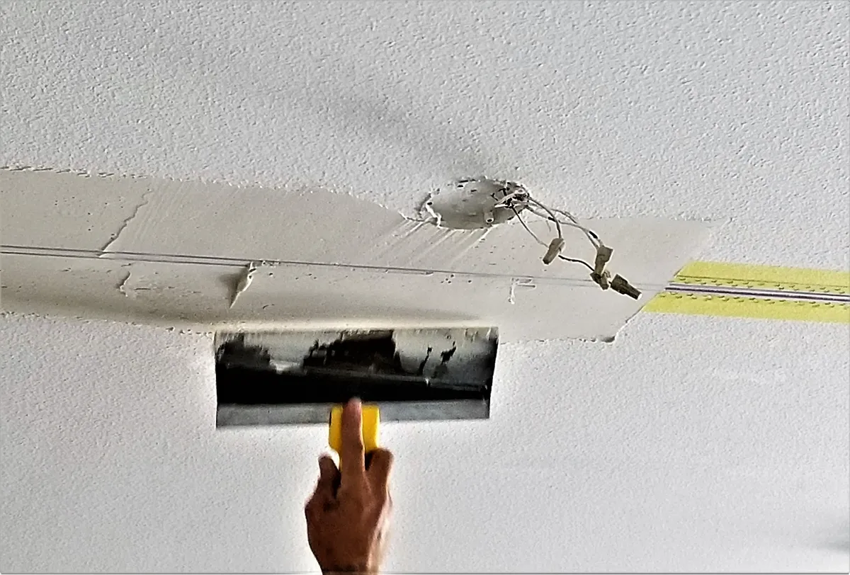 Plastering Craftsman Preparing Wall Surface
