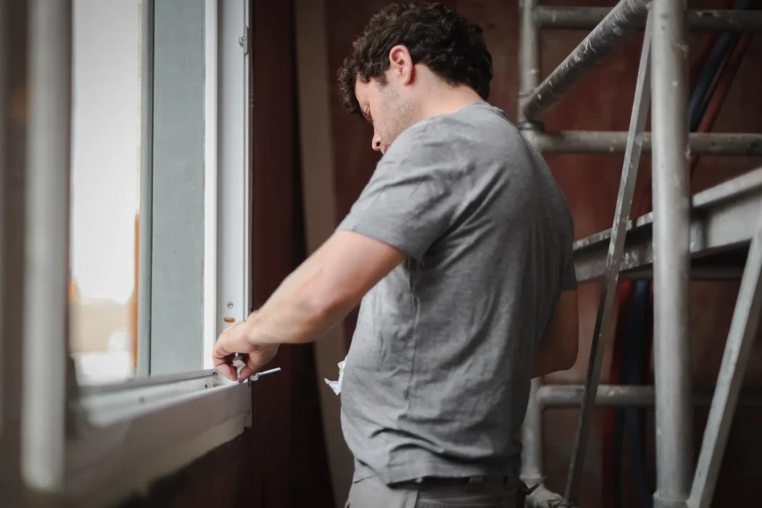 Expertly installed custom-made window frames enhancing home insulation and modern façade design