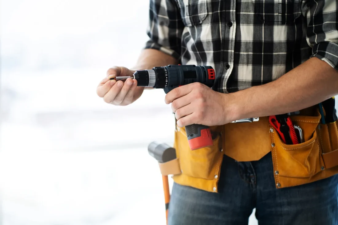 Electrician performing safe and professional electrical installation compliant with NEN 1010 standards